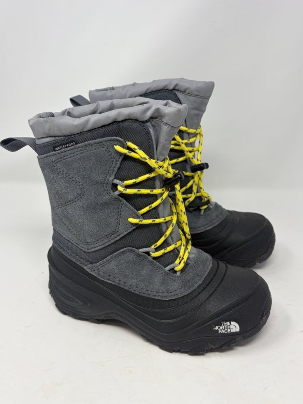 The North Face kids Alpenglow V snow boots 1 grey yellow boys
